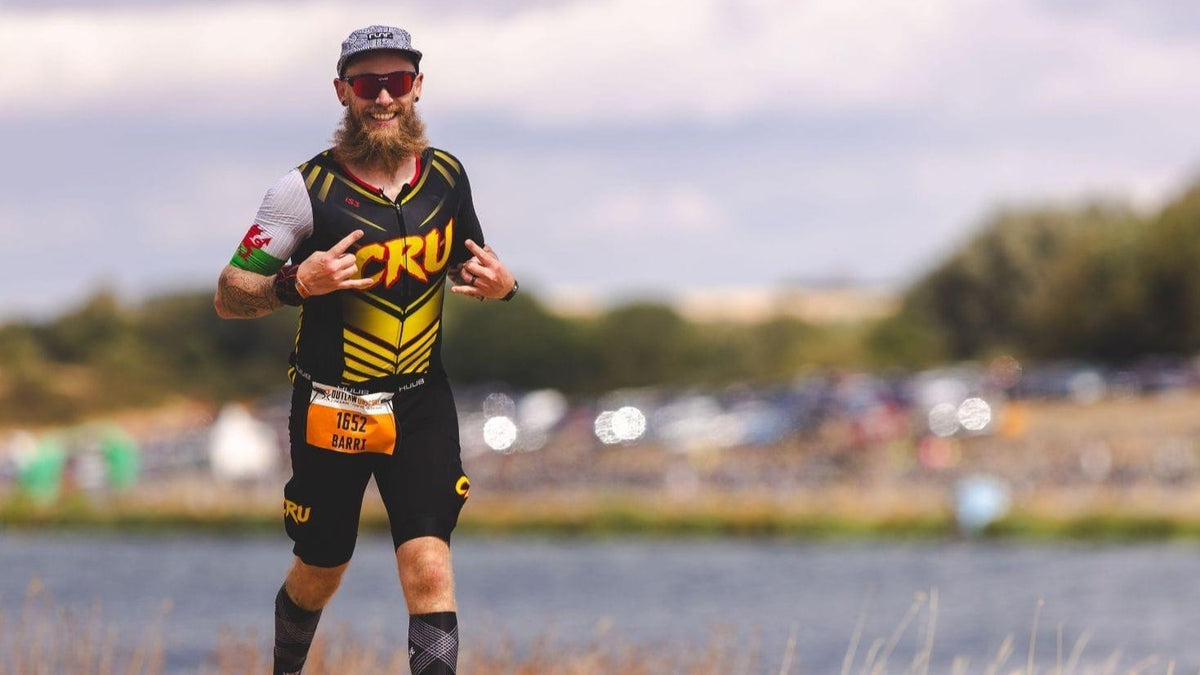 Athlete racing in iS3 custom triathlon kit